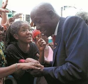 Activist Dr Merle Hodge greets Opposition Leader Dr Keith Rowley prior to the sitting. Photo courtesy Trinidad Guardian website.